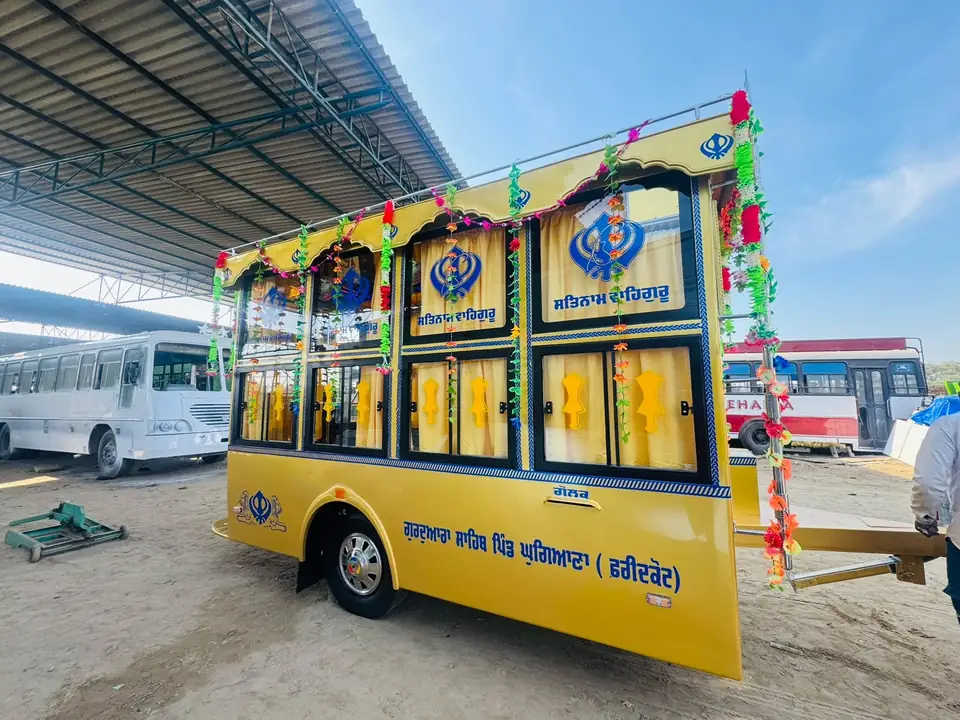 Palki Sahib, decorated for Nagar Kirtan, side three-quarter view — built by Guru Kirpa Bus Body Builders, Barnala